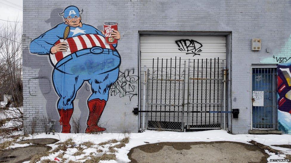 Graffiti showing Captain America covers an abandoned building in Detroit. File photo from February 2013