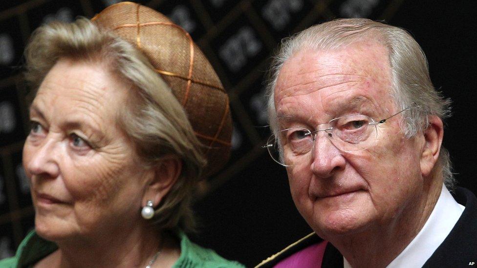 King Albert II, right, and his wife Queen Paola watch as Philippe takes the oath at the Palace of the Nation in Brussels, 21 July 2013