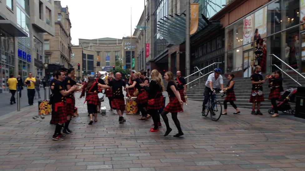 People dancing in the street