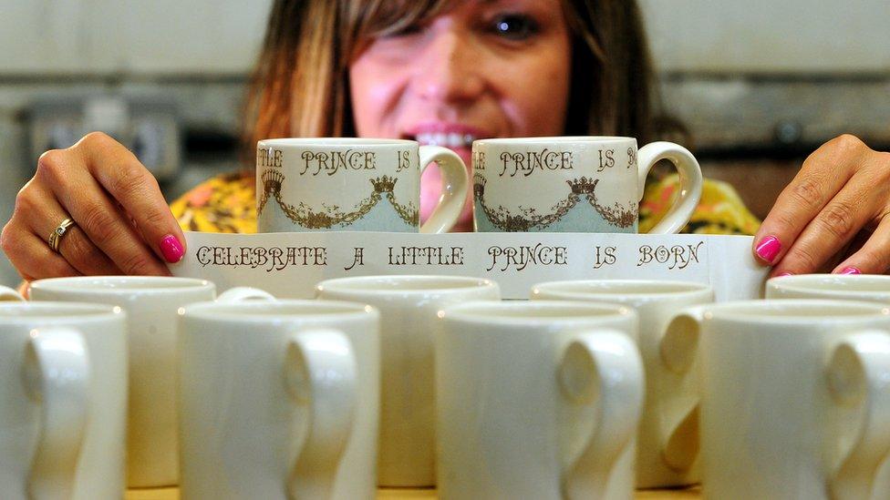 two memorabilia prototype mugs awaiting the Royal Baby to be named before going into production at Burleigh factory, Stoke On Trent.