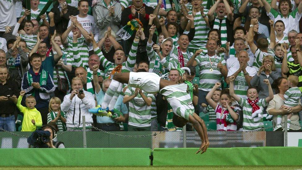 An acrobatic celebration from Efe Ambrose after his goal against the Belfast visitors