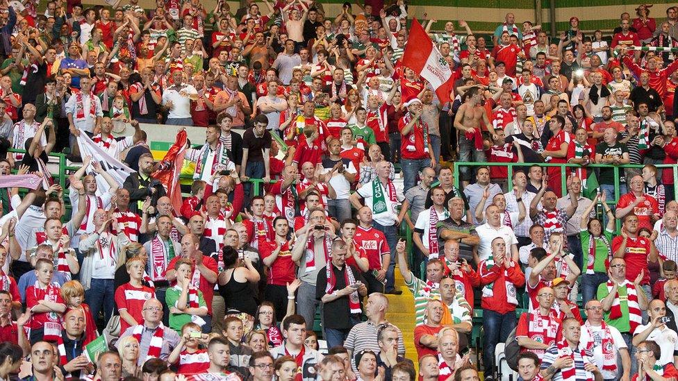 Cliftonville fans show their support for the team after the 2-0 defeat by Celtic sent the Reds out 5-0 on aggregate