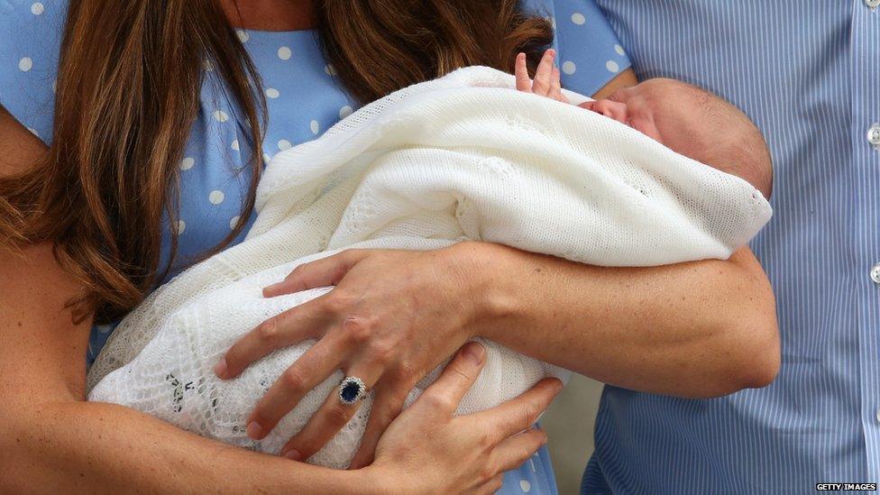 The duchess cradling her baby boy