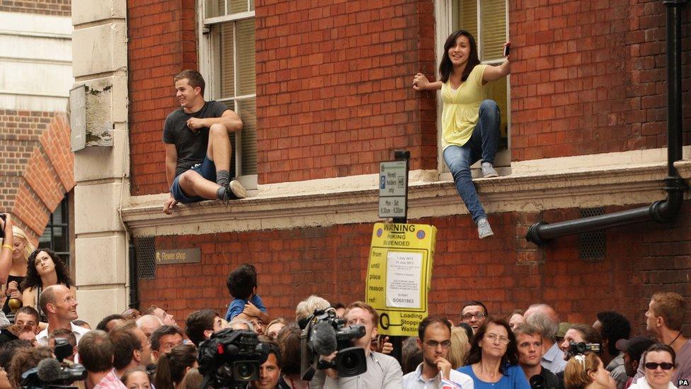 The crowd outside the Lindo Wing of St Mary's Hospital