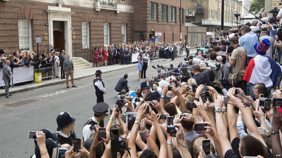 The crowd outside the Lindo Wing of St Mary's Hospital