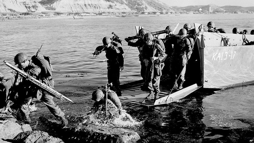 Soldiers of the First US Cavalry Division land ashore at Pohang on the east coast of Korea during the Korean War. July 1950