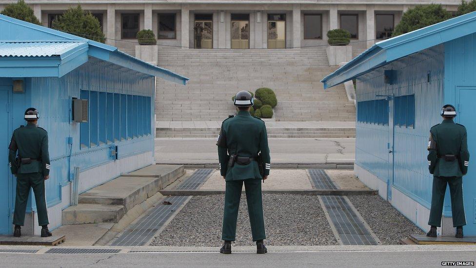 South Korean soldiers stand guard at the border village of Panmunjom between South and North Korea at the Demilitarized Zone (DMZ) on 23 April 2013 in Panmunjom, South Korea