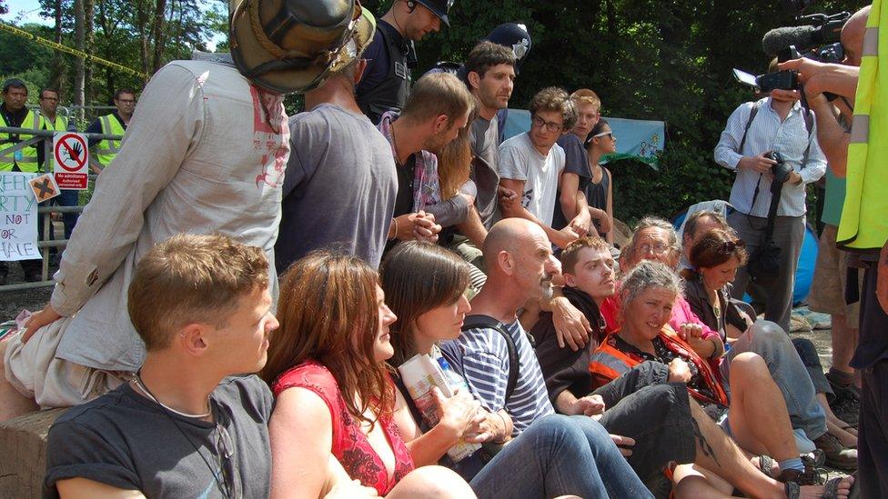 Protesters in front of gate