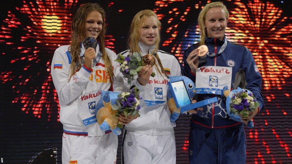 Ruta poses with her medal