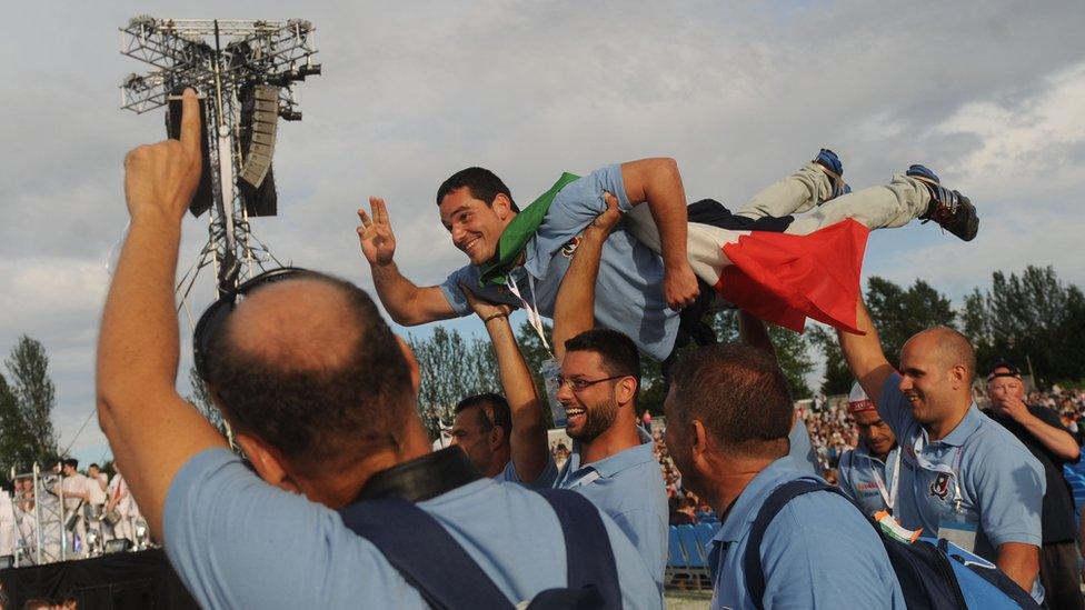 Competitor strikes Superman pose