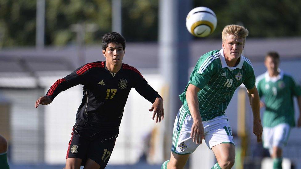 Erick Gabriel Gutierrez and Cameron McGeehan keep their eyes on the ball during the Elite Section final