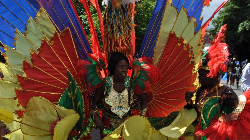 People taking part in the Caribbean carnival parade in Leicester