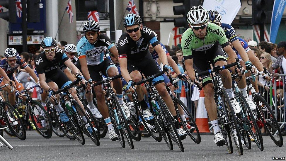 Cyclists taking part in a 100-mile race from Surrey to London