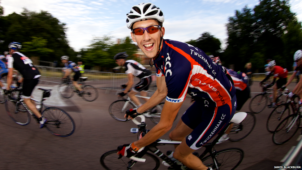 Cyclist Alex Tinsley, from Twickenham Cycling Club, at 06:50 BST near Richmond Gate