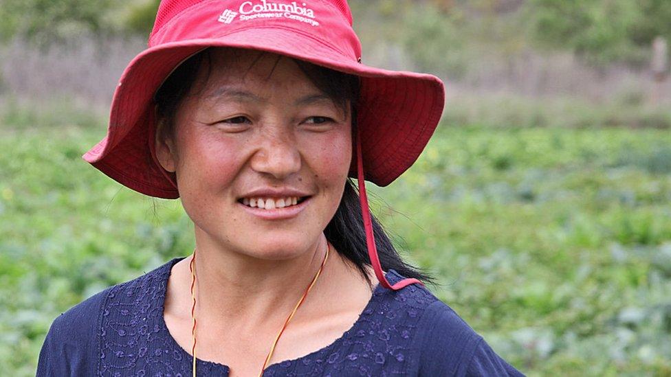 Tshering Pelden wearing a hat.