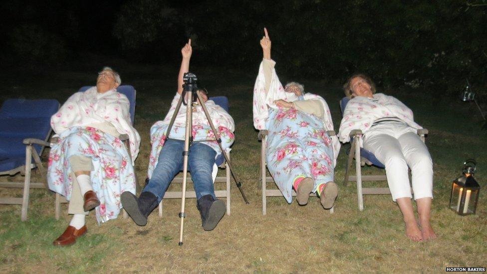 Three generations of the Horton Baker family watching the stars from their back garden in Ripley, Surrey in England. Photo: Dawn Horton Baker