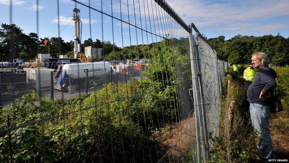 Man outside Caudrilla fence