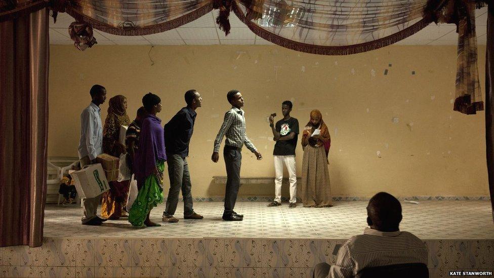 Actors rehearsing for a play addressing the theme of corruption, which was performed during the closing ceremony of the book fair, in front of a diverse crowd of guests including government ministers and elders - Hargeisa, Somaliland