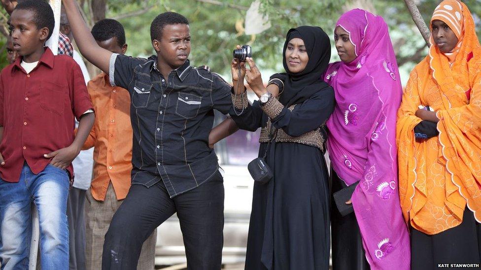 Audience watching a Somaliland circus performing on the last day of the book fair - Hargeisa, Somaliland