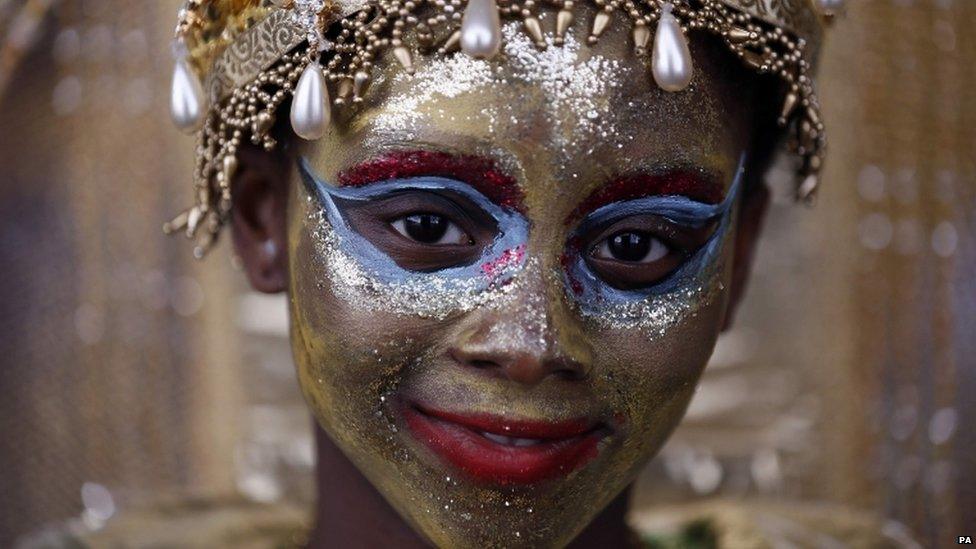 A child participates in the children's day parade