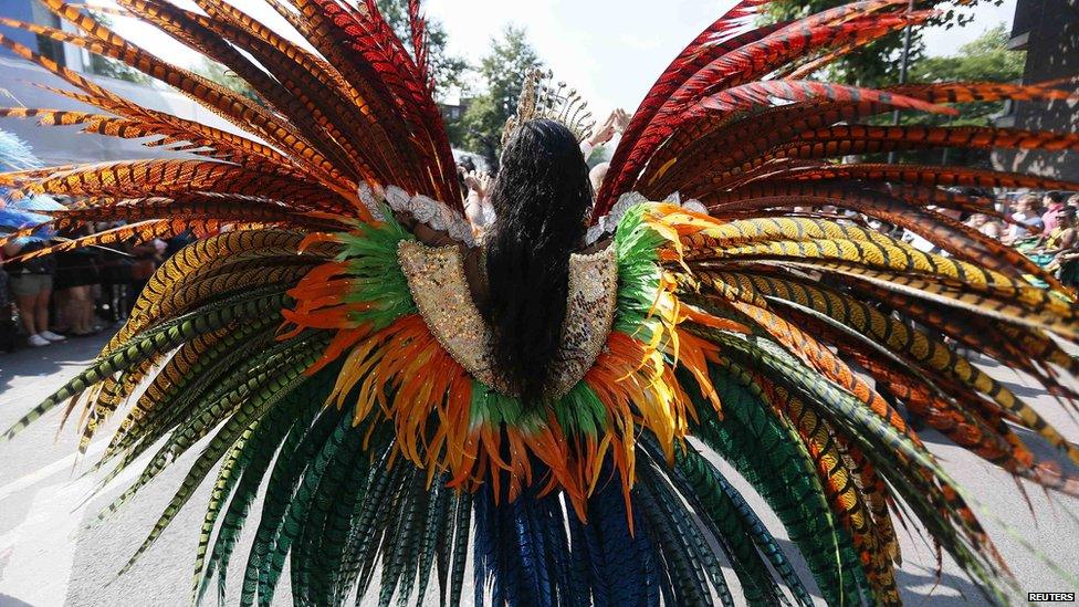 Woman in feather costume