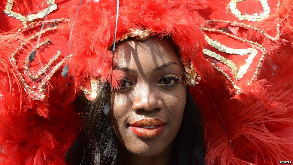 Woman in red feather headdress