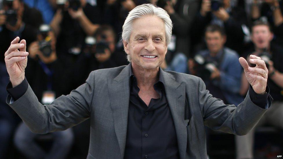 US actor Michael Douglas poses on May 21, 2013 during a photocall for the film Behind the Candelabra at the Cannes Film Festival in Cannes.