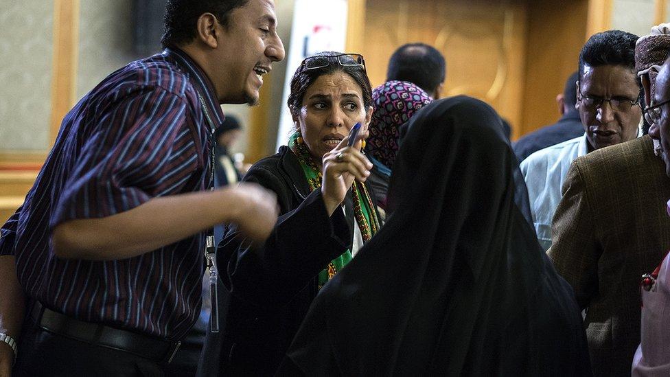 Arwa Abdu Othman, chairwoman of the NDC’s Rights and Freedoms Working Group, speaks to other members of the NDC