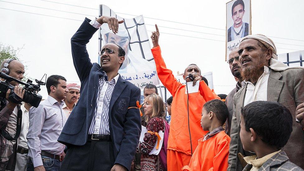 NDC member Baraa Shaiban attends a rally outside the American embassy in Sanaa alongside both relatives of Yemeni prisoners at Guantanamo Bay, in Cuba, and citizens killed by US drone strikes in Yemen