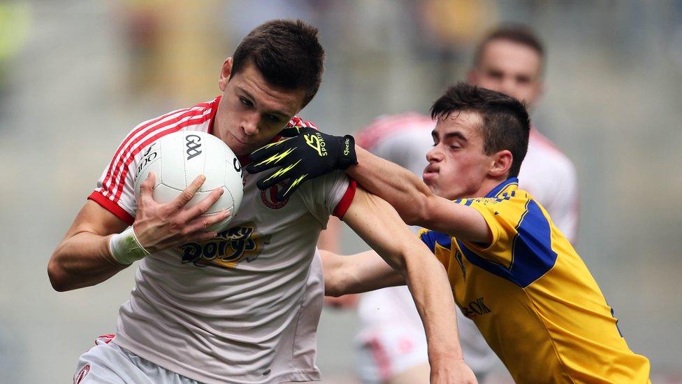 The impressive Conor McKenna secures possession for Tyrone as Jack Earley puts in a challenge