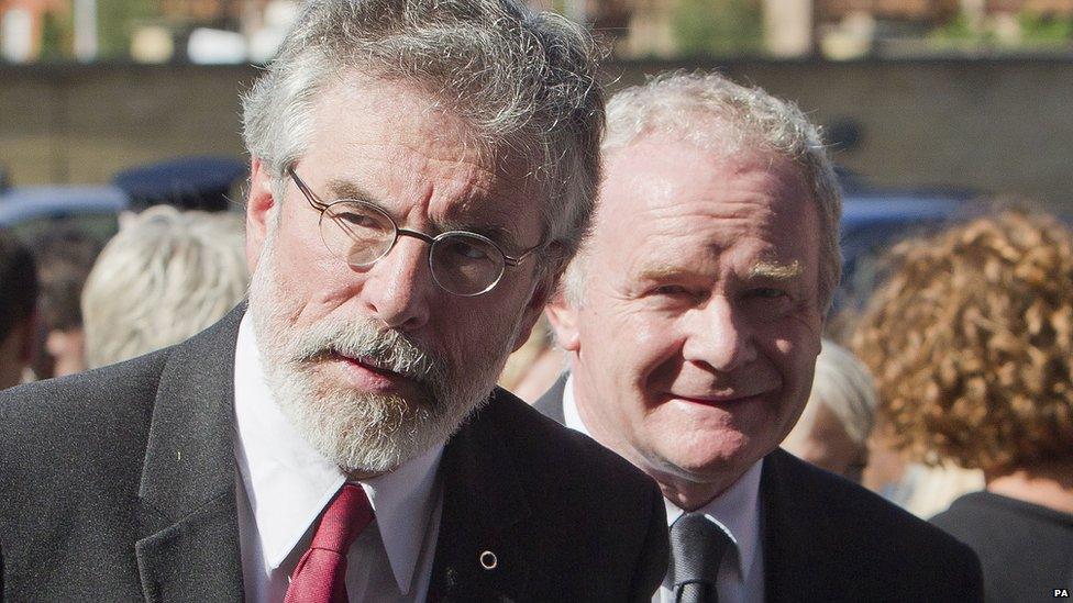 Sinn Féin President Gerry Adams anbd Northern Ireland Deputy First Minister Martin McGuinness attend the funeral of Seamus Heaney.