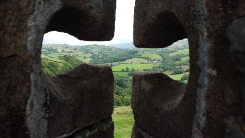 A view through the arrow slits at Carreg Cennen Castle