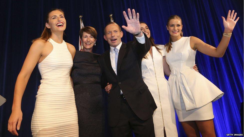 Tony Abbott and his family from right, Bridget, Louise, wife Margaret and Frances wave after he delivered his victory speech on 7 September