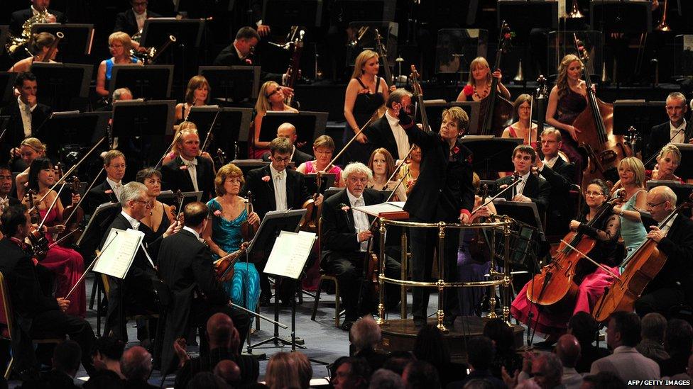 US conductor Marin Alsop conducts the orchestra at the Royal Albert Hall in west London on September 7, 2013 during the Last Night of the Proms