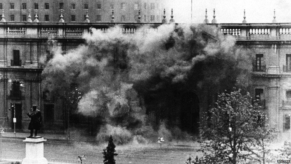 The Chilean presidential palace La Moneda under fire during the coup