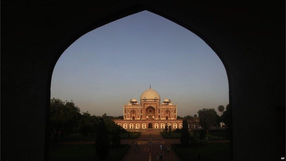 Visitors leave after the inauguration of the restored 16th century Humayun"s Tomb by Indian Prime Minister Manmohan Singh