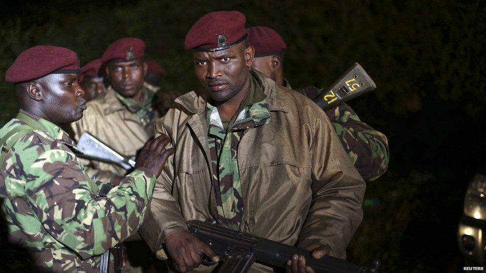 Kenyan soldiers are pictured near Nairobi's Westgate shopping centre on Monday September 23 as the siege continues for a third night.