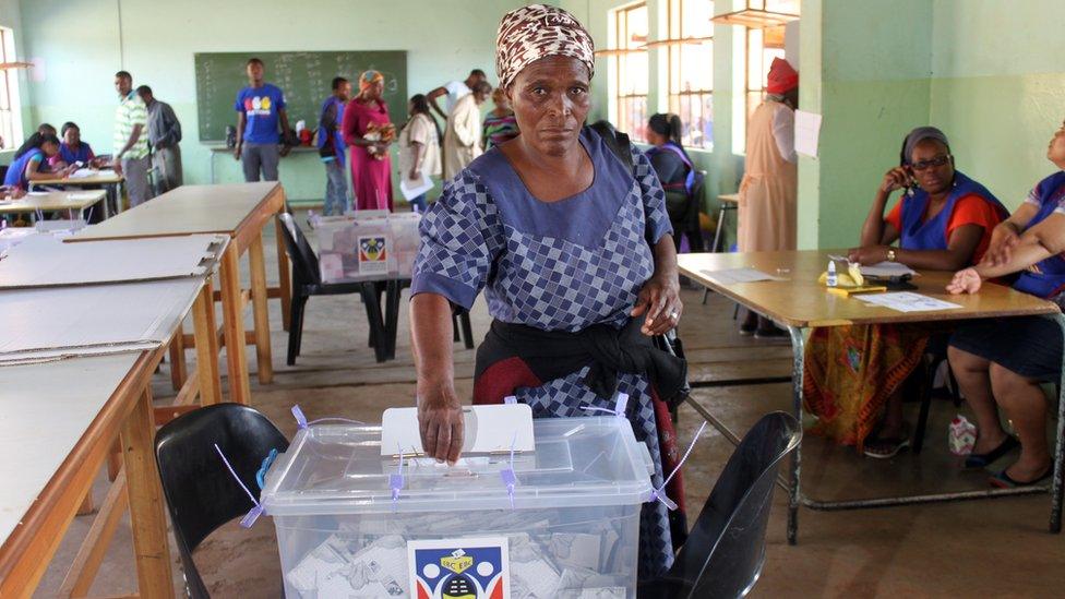 An elderly lady casts her vote at Nsongweni High School polling station in Nhlangano, Swaziland on September 20, 2013