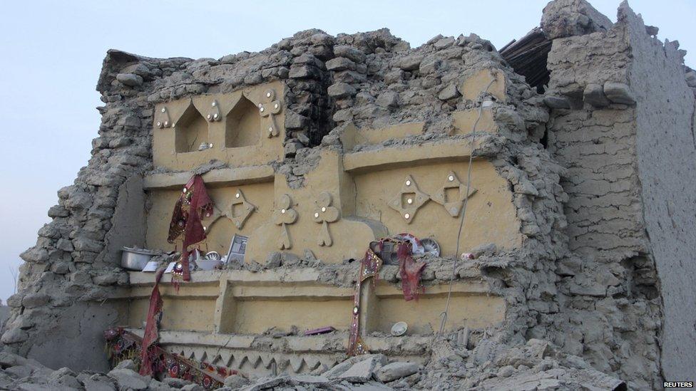 The rubble of a house is seen after it collapsed following the quake in the town of Awaran