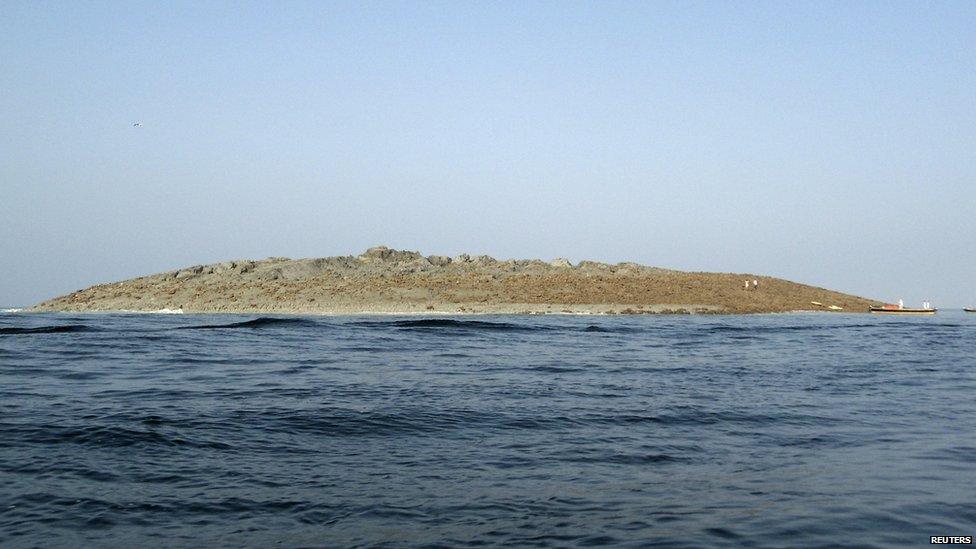 An island that rose from the sea following an earthquake is pictured off Pakistan's Gwadar coastline in the Arabian Sea