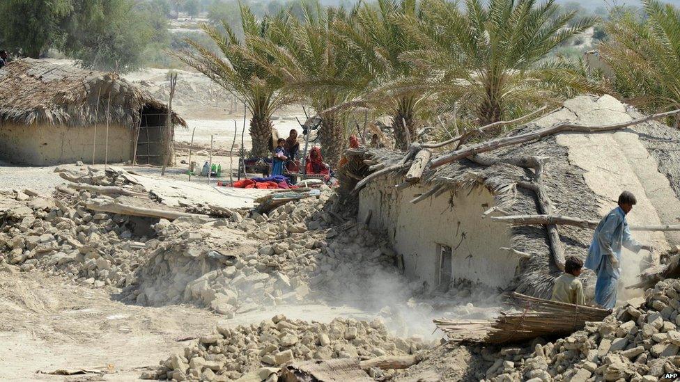 Collapsed homes in Awaran district on 25 September 2013