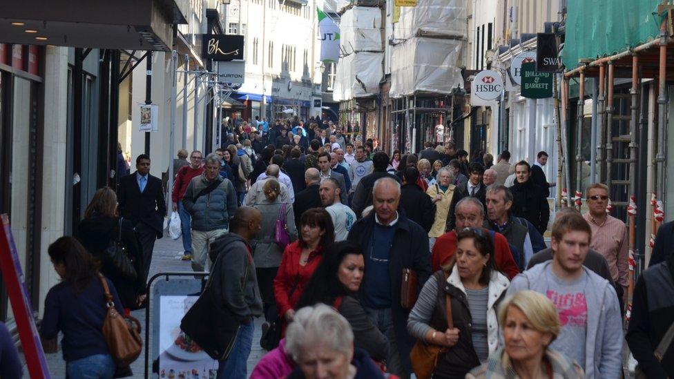 People walking down King Street