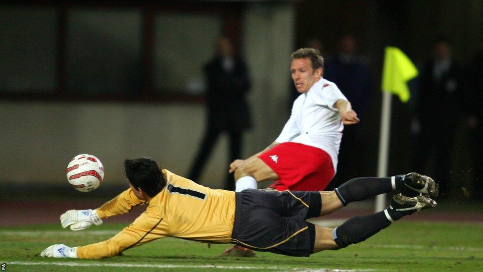 Austria goalkeeper Helge Payer saves at the feet of Bellamy as Wales fall to an unlucky 1-0 defeat in a World Cup qualifier in Vienna