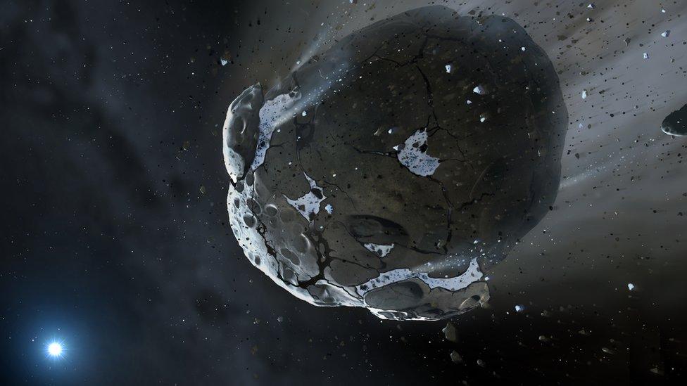 Artist's impression of an asteroid being torn apart