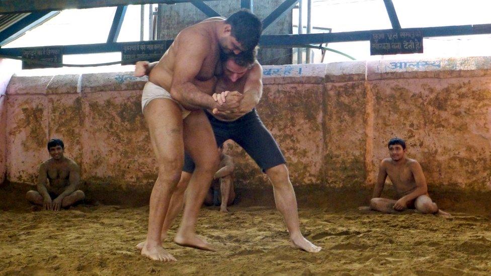 Mark Beaumont wrestling in the akhara