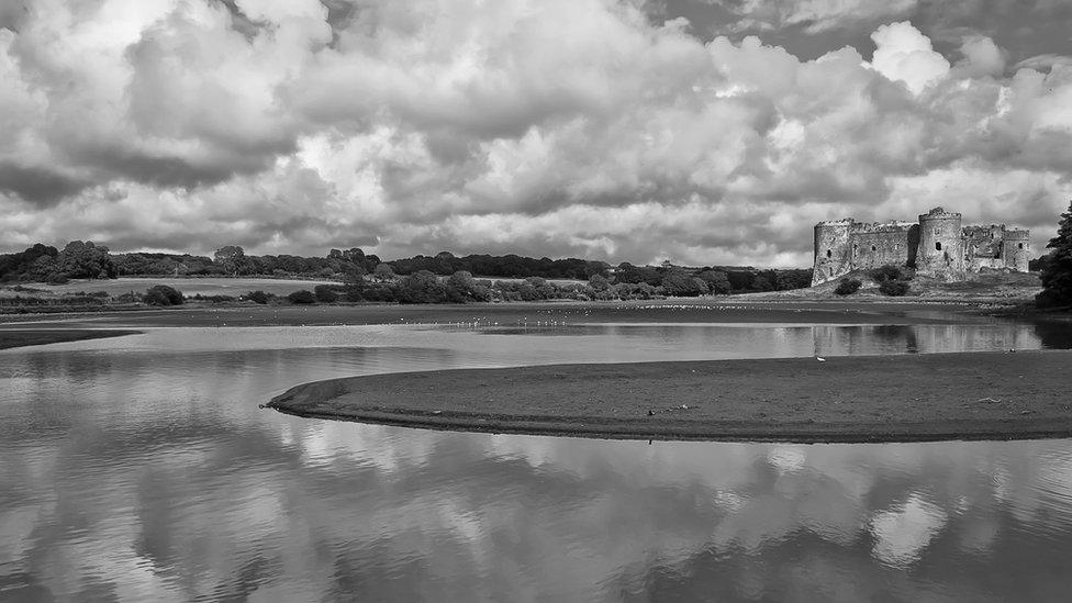 Jason Davies took this black and white photograph of Carew Castle in Pembrokeshire