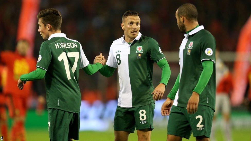 On Bellamy's final appearance, in the 1-1 draw against Belgium On Bellamy's final appearance, in the 1-1 draw against Belgium on 15 October 2013, the 34-year-old shakes the hand of the youngest player in Welsh history, Harry Wilson who was 16 years and 207 days old