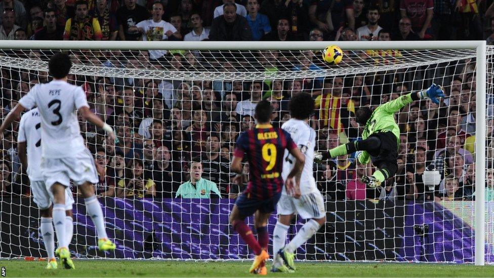 Barcelona winger Alexis Sanchez scores against Real Madrid