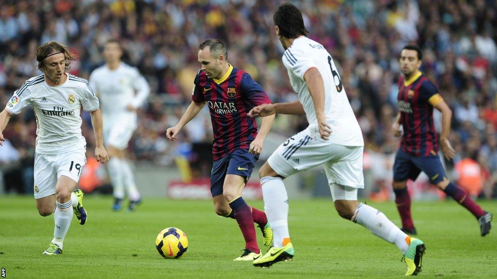 Barcelona midfield duo Andres Iniesta and Xavi dominated possession in El Clasico against Real Madrid