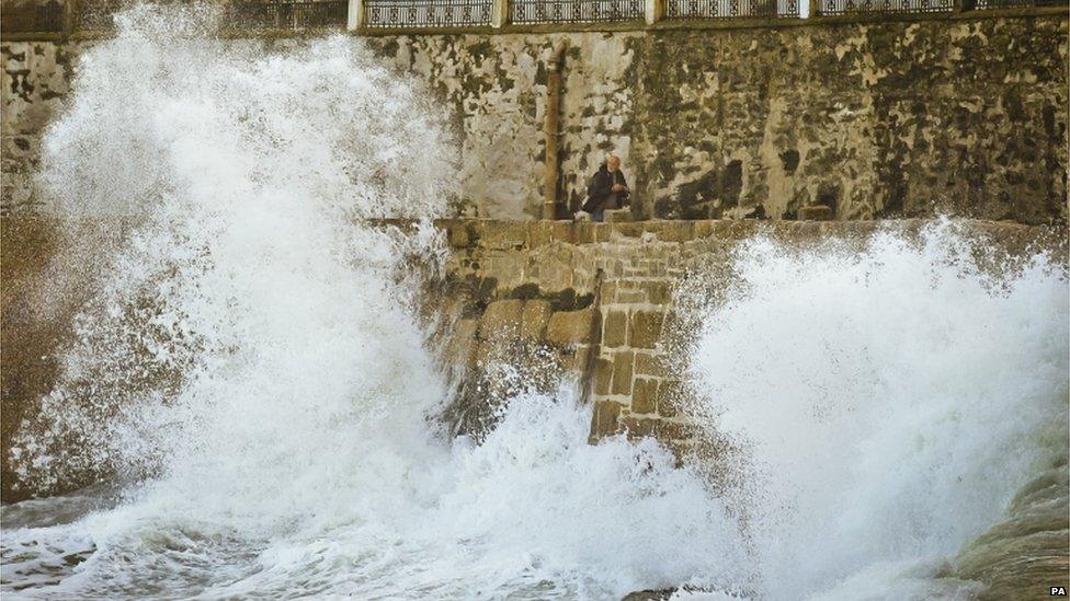 Waves hitting the harbour wall in Porthleven